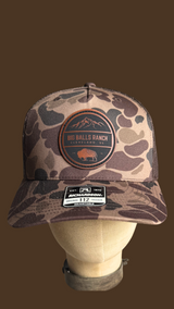 Camouflage trucker hat with BBR logo on a leather patch 